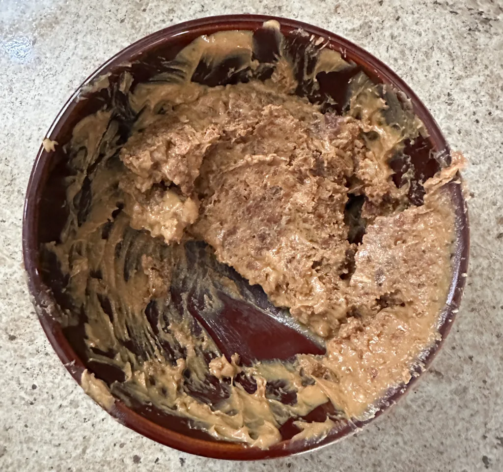 Chopped up dates mixed with peanut butter.