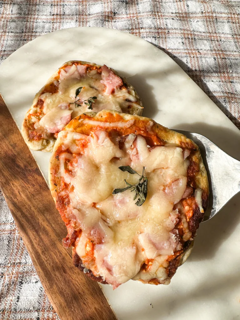 A close up of Italian pie with a spatula.