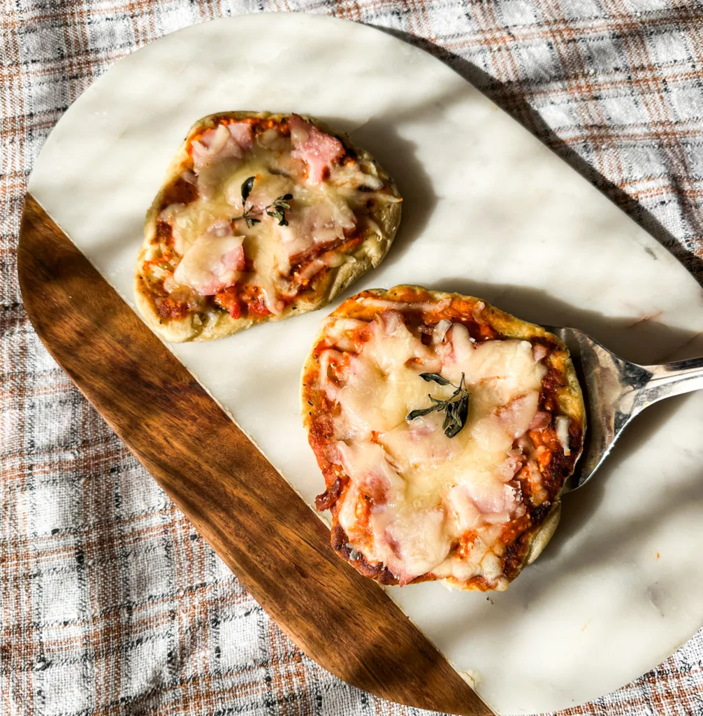 Italian pie on a cutting board with a spatula.